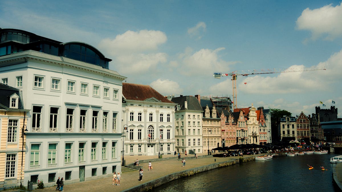 Historic Flemish architecture along the river in Ghent Belgium on a summer day