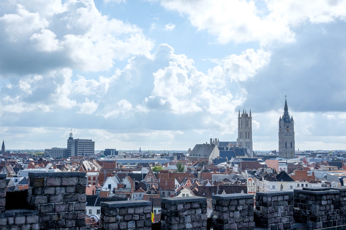Wide panoramic view of Ghent showing church spires from Gravensteen Castle Belgium