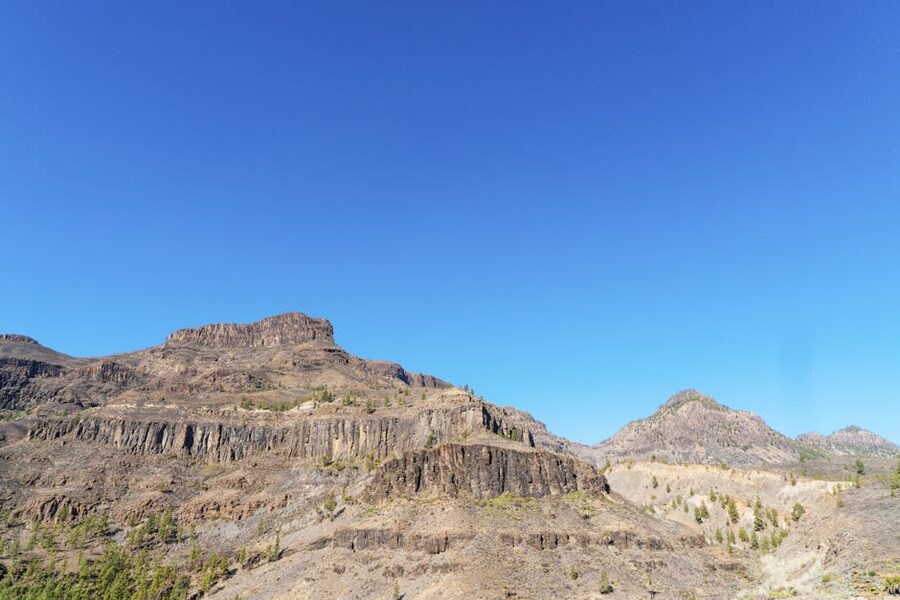 Dramatic rock formations against blue sky in Gran Canaria