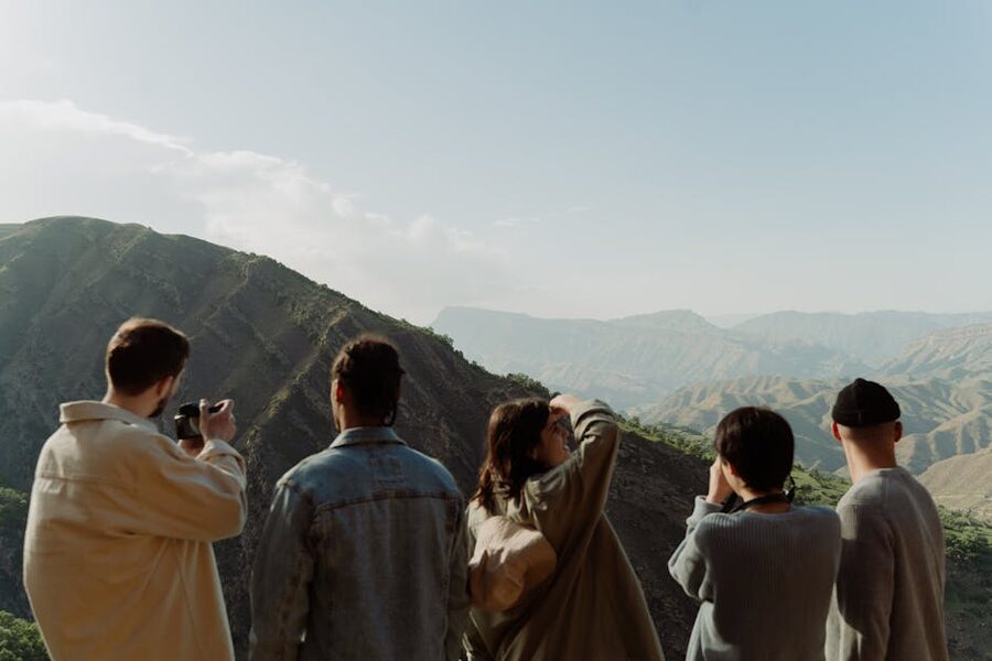 Group of friends at a mountain viewpoint