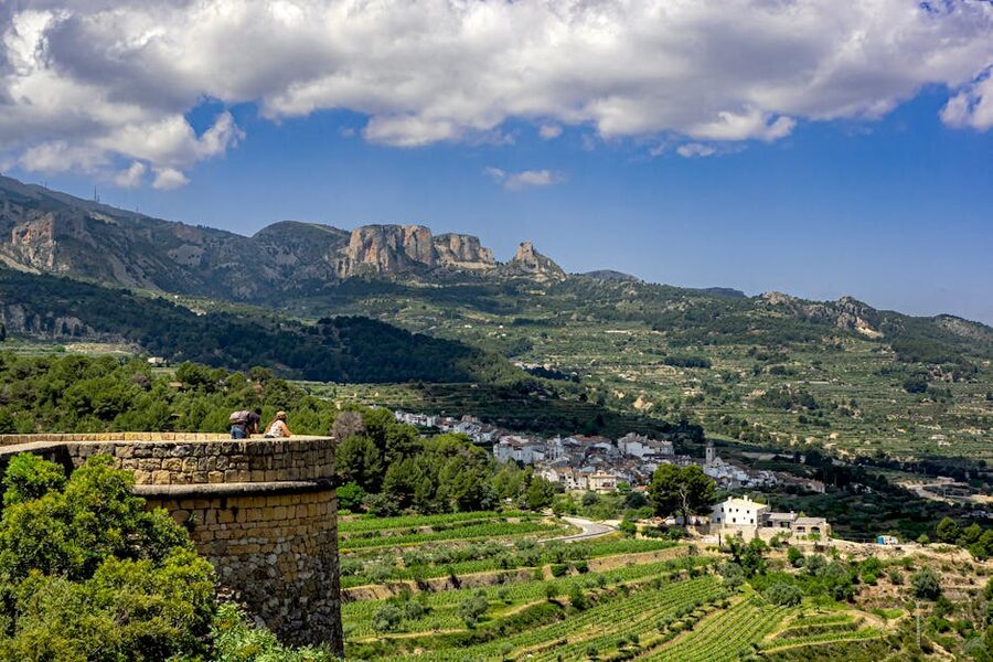 Green fields and mountains in the Guadalest Valley