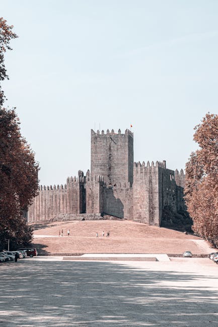 Narrow medieval cobblestone street in the old town of Guimaraes Portugal