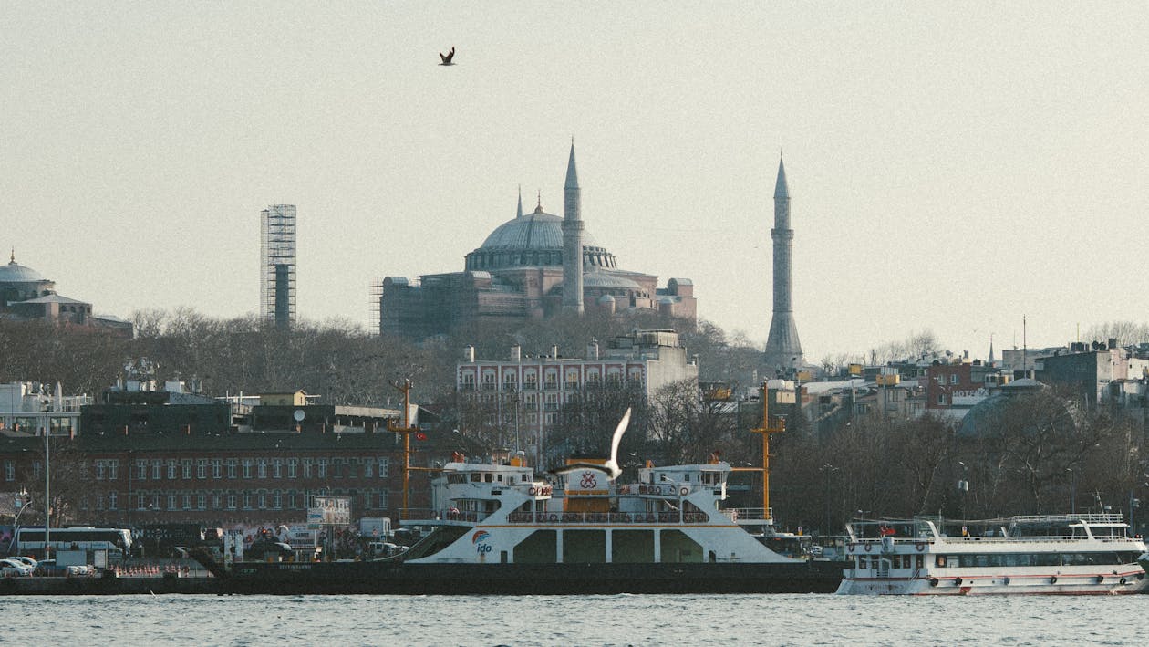 View of Hagia Sophia and boats on the Bosphorus in Istanbul