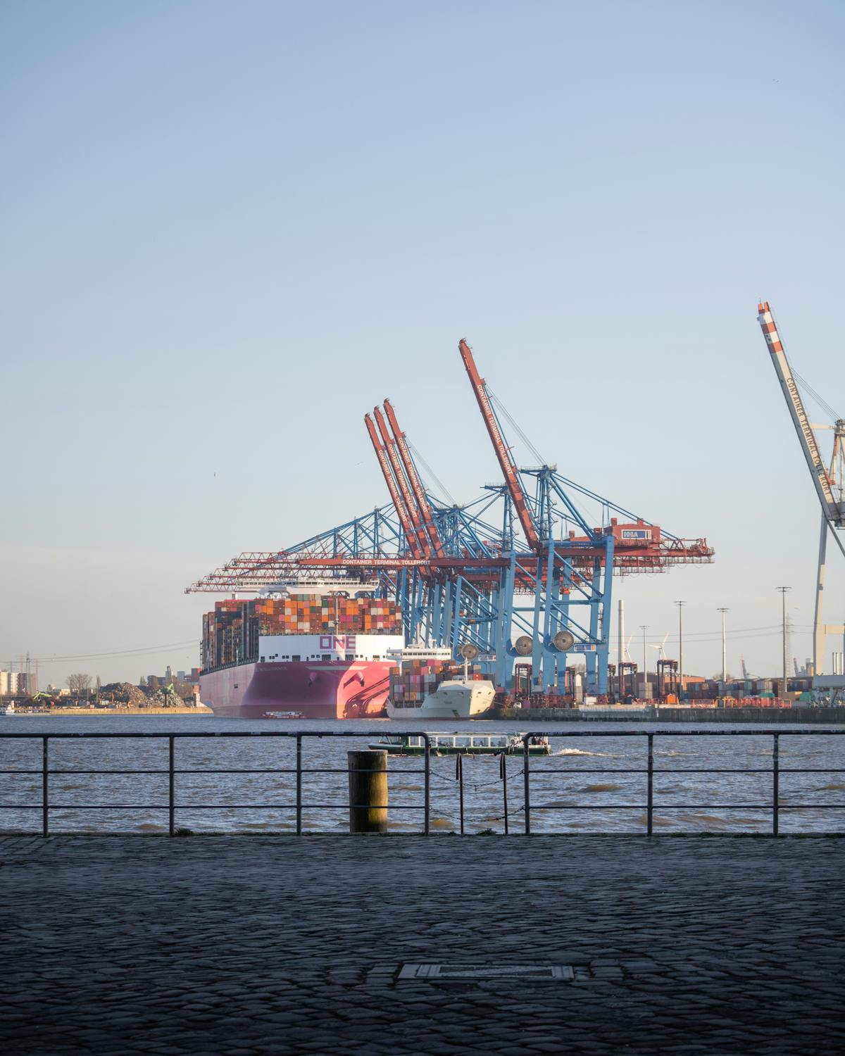 Panoramic view of Hamburg harbor at golden hour
