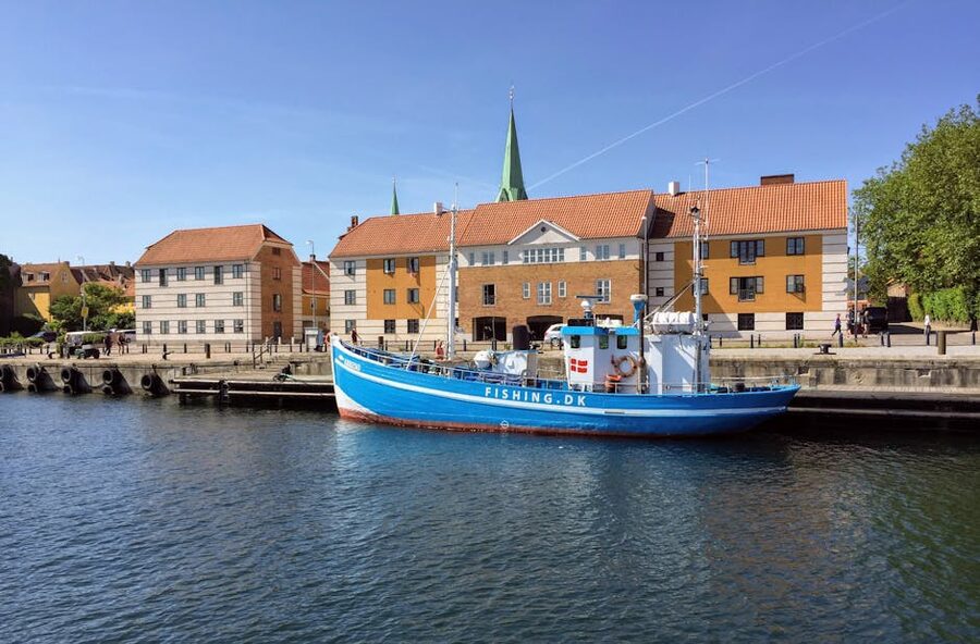 Helsingor harbor blue fishing boat moored