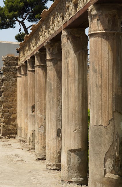 Ancient Roman columns still standing at the Herculaneum archaeological site in Italy