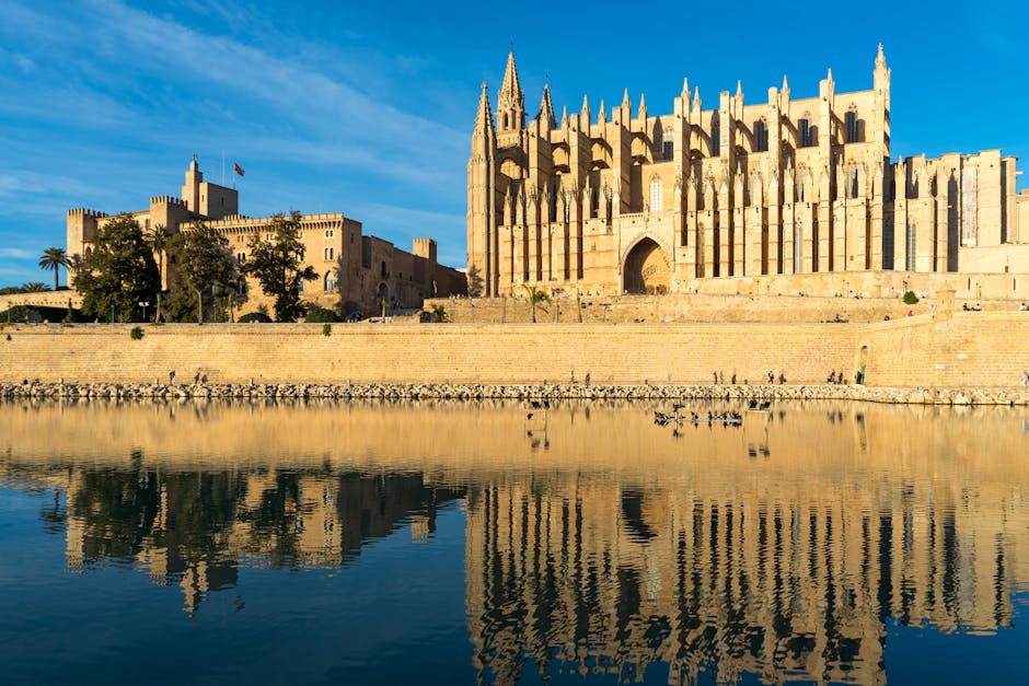 La Seu Cathedral in Palma reflecting in the water at dawn