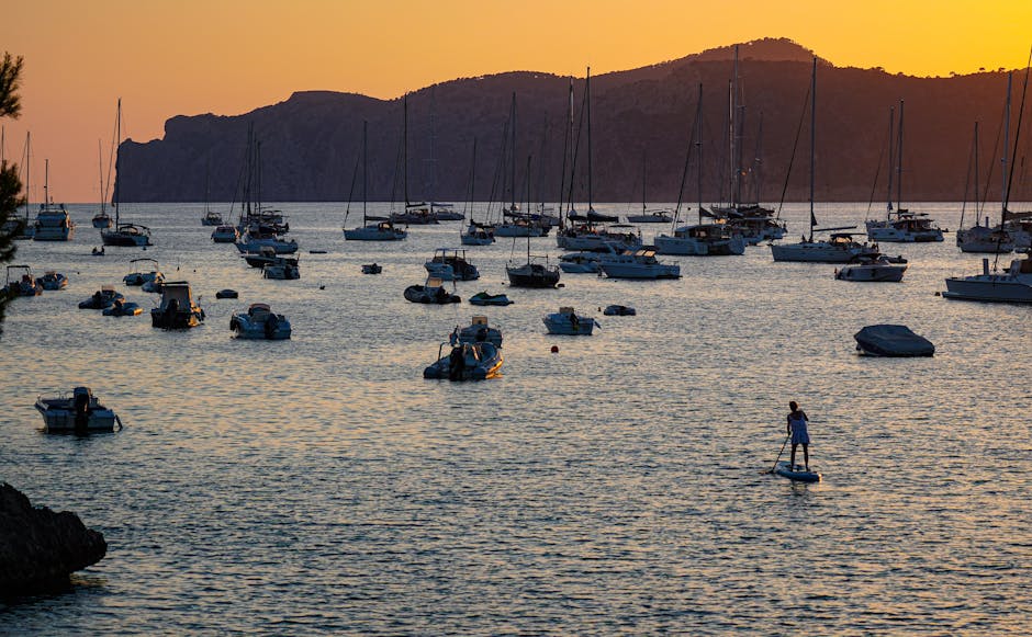 Sunset view of boats anchored in Santa Ponsa bay Mallorca