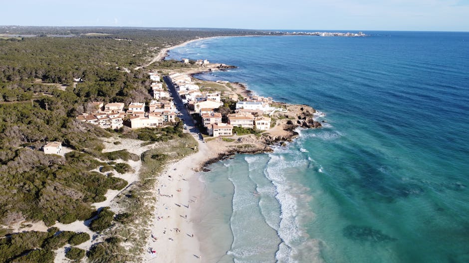 Aerial view of Ses Covetes beach and turquoise waters in Mallorca