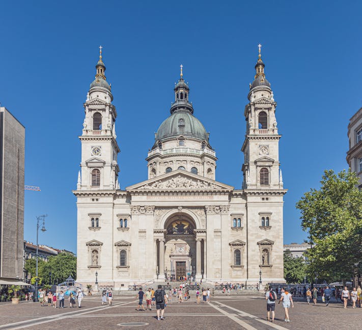 People walking on square in front of St Stephens Basilica