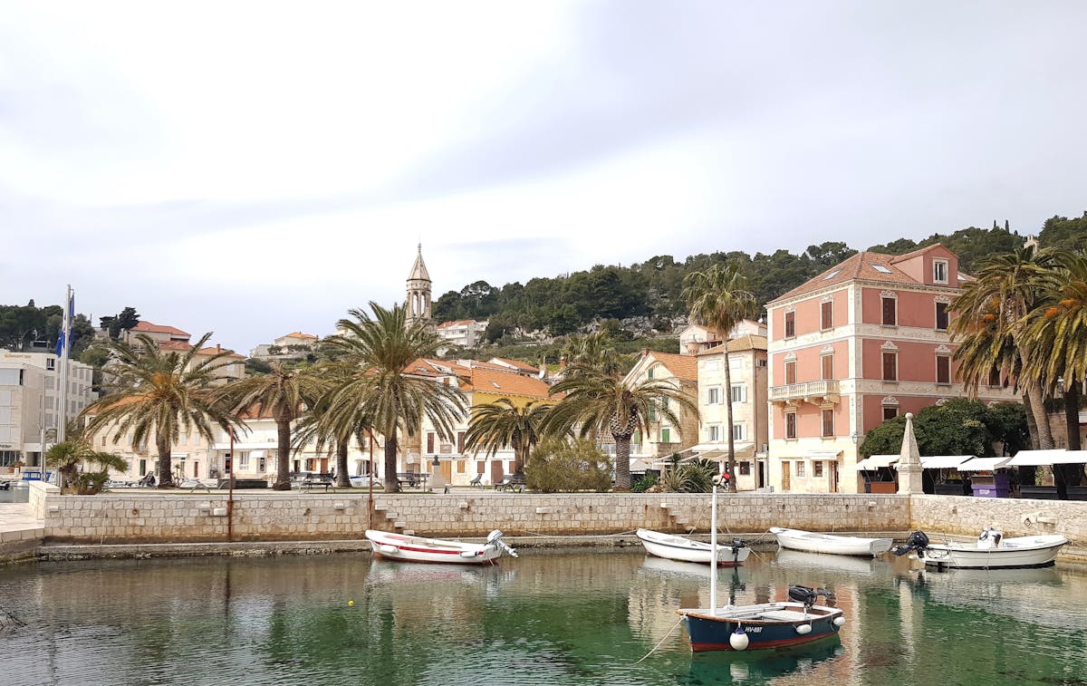 Hvar harbour with boats and historic buildings