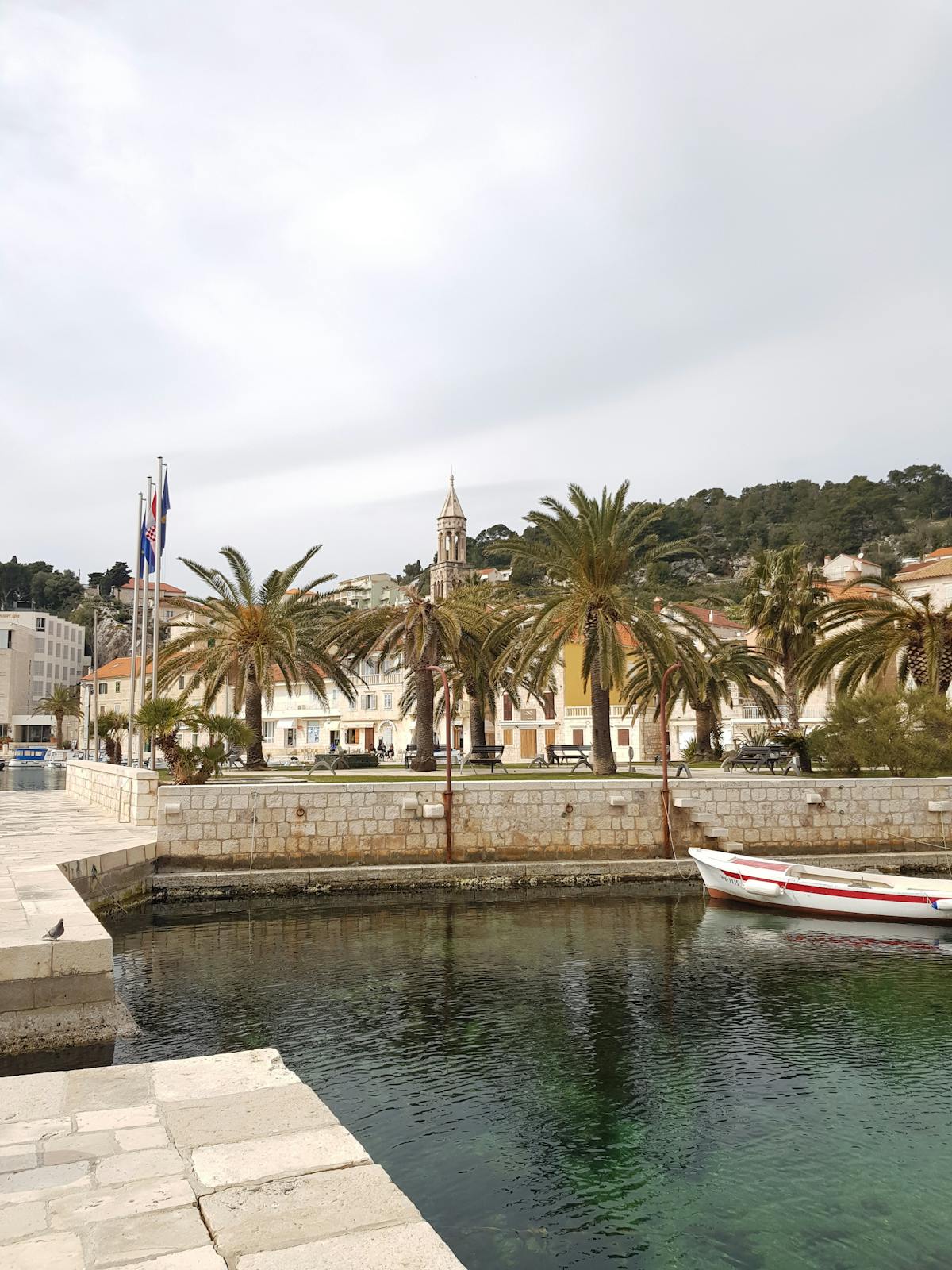 Hvar harbour palm-lined promenade