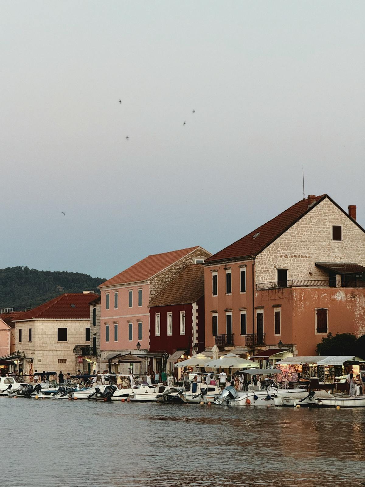 Stari Grad waterfront with colourful houses and boats
