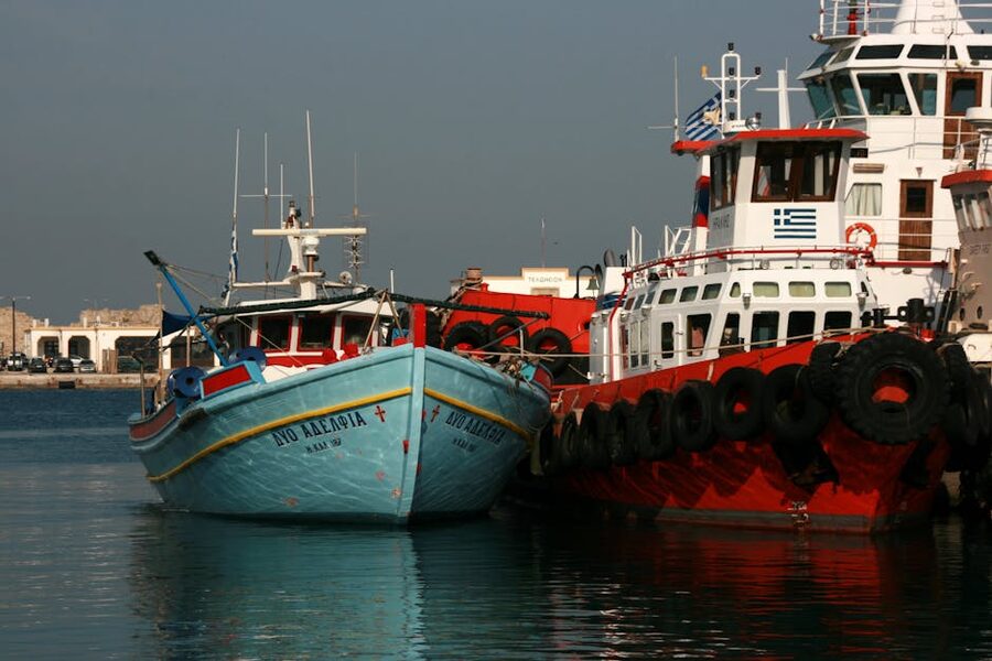 Greek fishing boats harbor sunny
