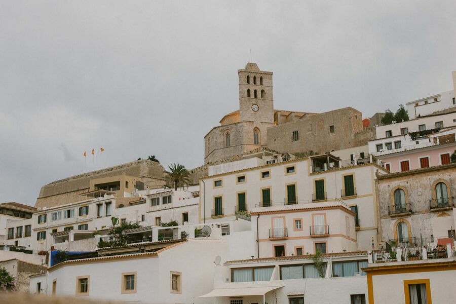 Historic church and old town architecture in Ibiza Dalt Vila on a cloudy day