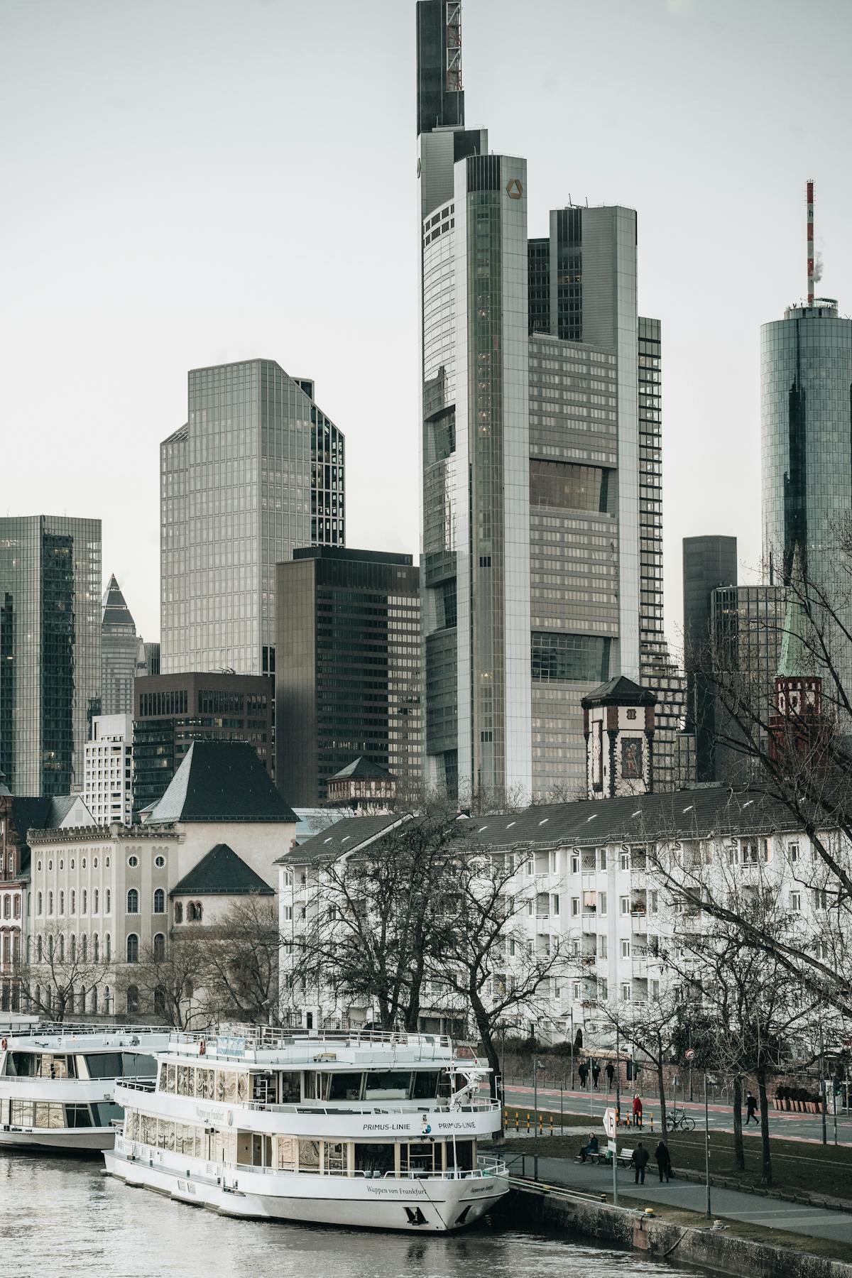 Frankfurt skyline reflected in the Main River on a clear afternoon