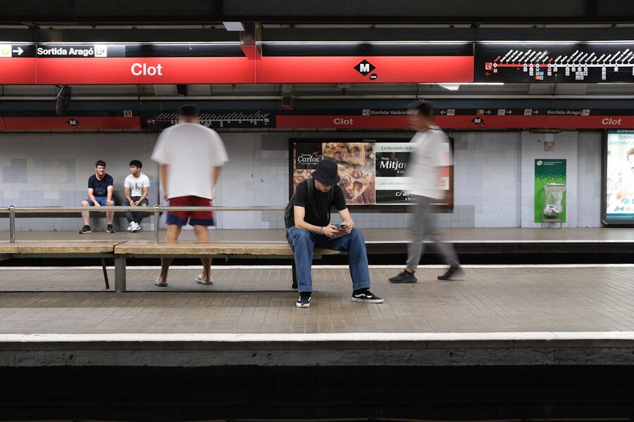 Commuters at Clot Metro Station in Barcelona