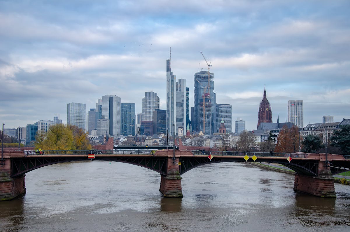 Frankfurt financial district lit up at night from the river