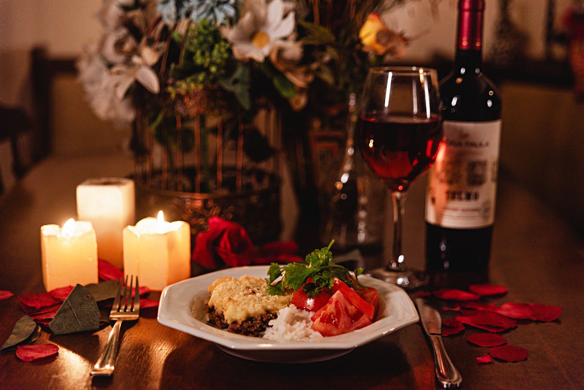 French gourmet dinner with wine glasses and elegant table setting