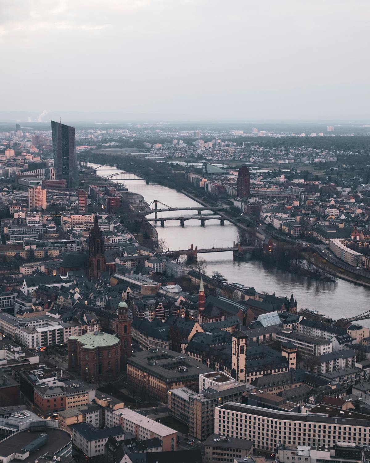 Boats moored along the Main River embankment in Frankfurt
