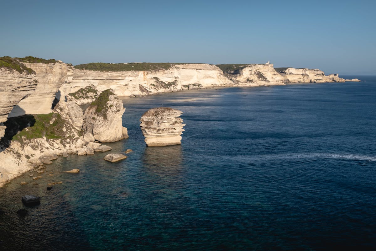 Bonifacio's dramatic white limestone cliffs towering above the turquoise Mediterranean Sea