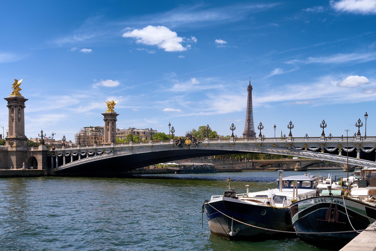 Pont Alexandre III bridge in Paris with ornate golden statues and lamps