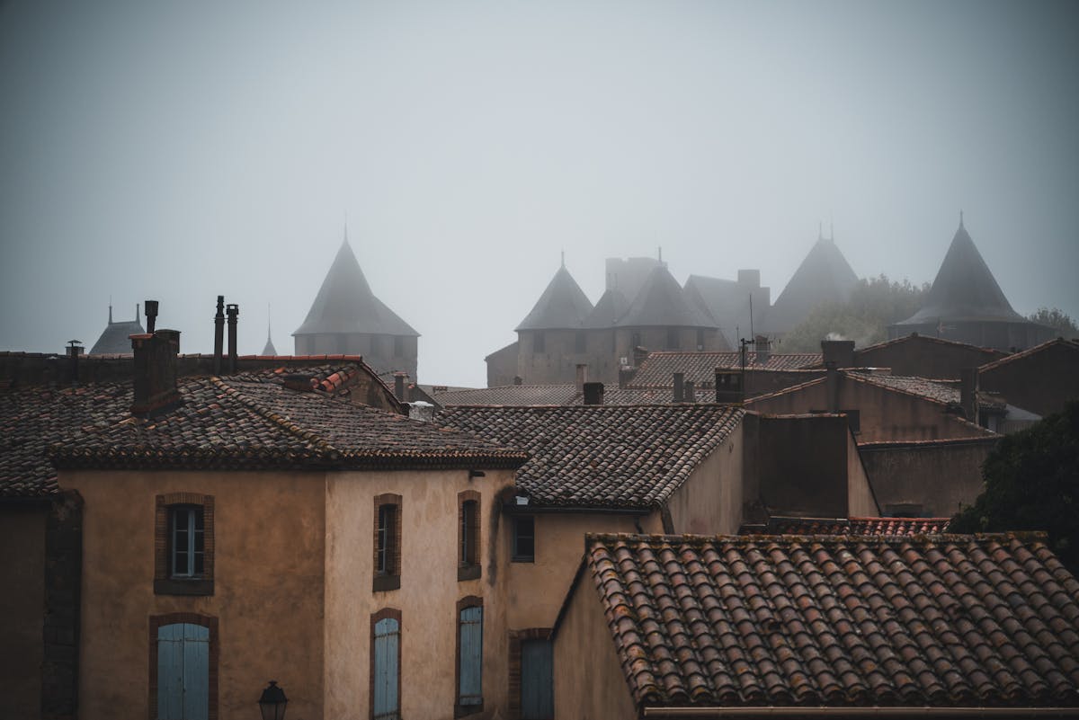 Foggy morning view of Carcassonne's medieval towers
