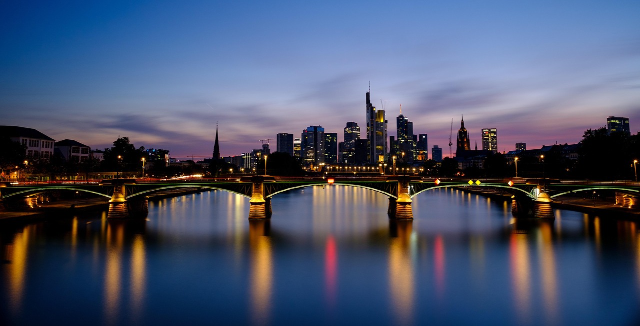 Frankfurt towers illuminated against the night sky