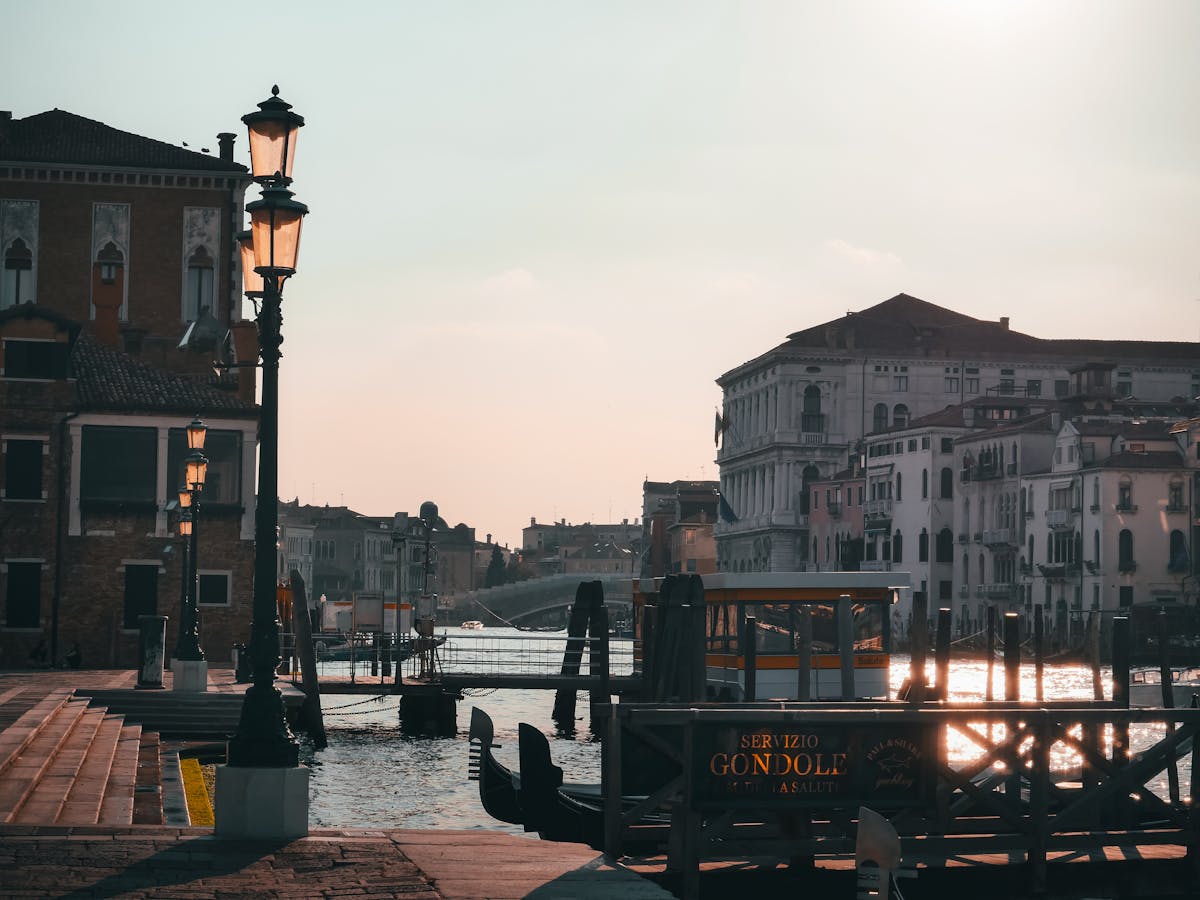 Gondolas at the Grand Canal in Venice during sunset