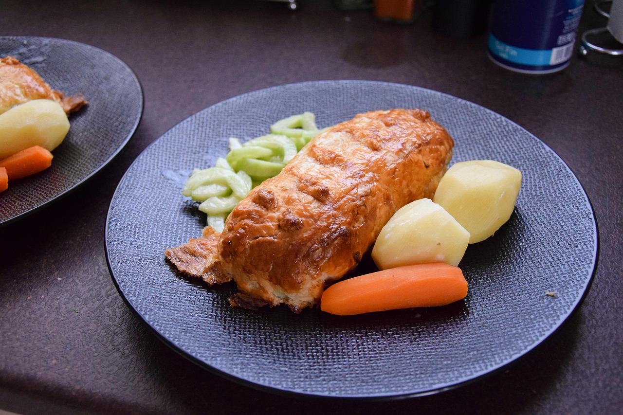 Beautifully plated French cuisine with carrots and vegetables
