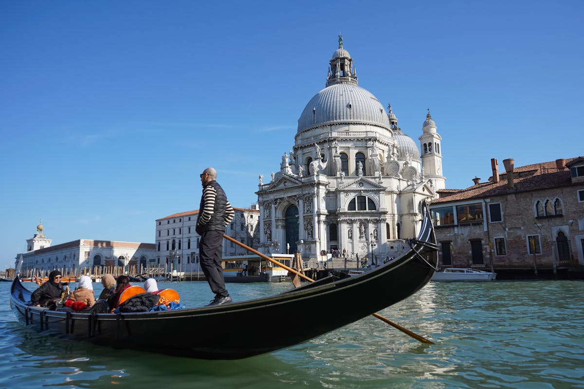 Gondola ride near the Santa Maria della Salute church in Venice