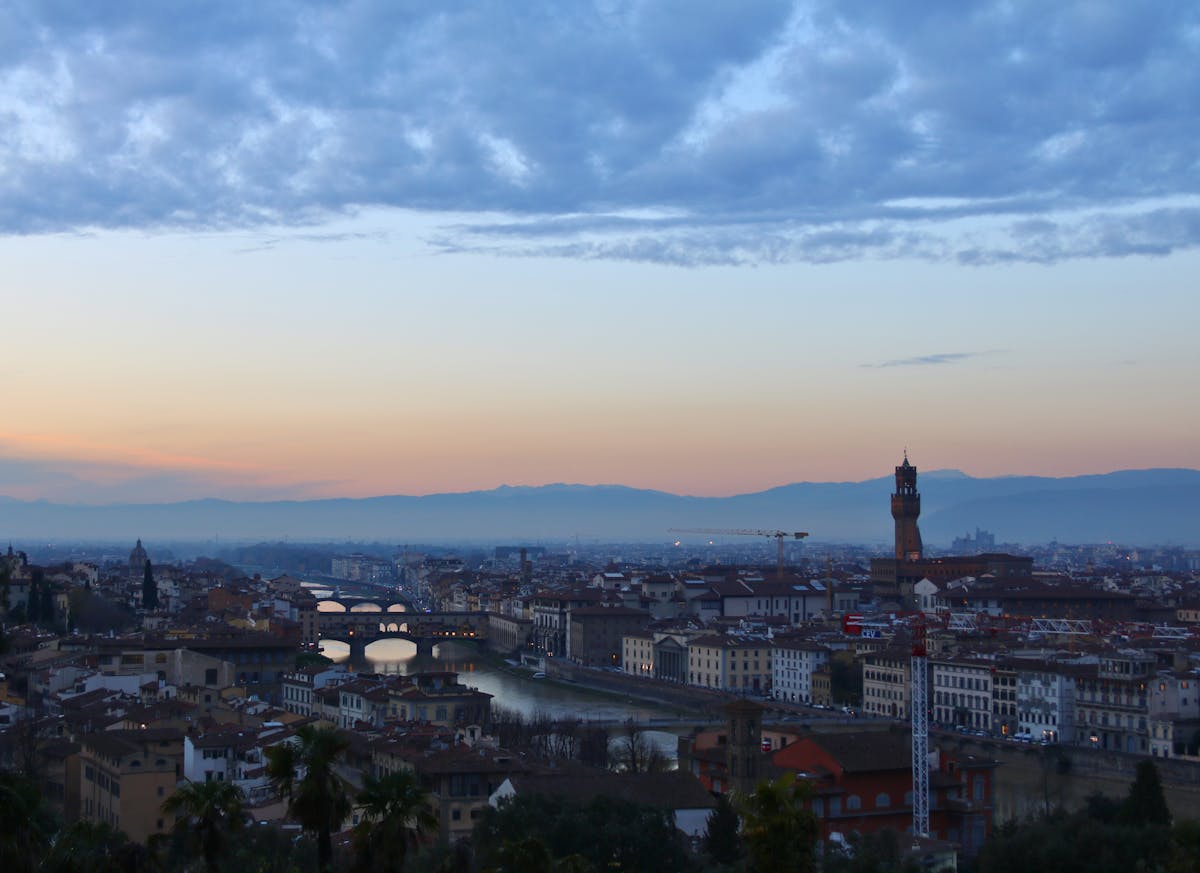 Florence Italy at twilight with iconic landmarks illuminated