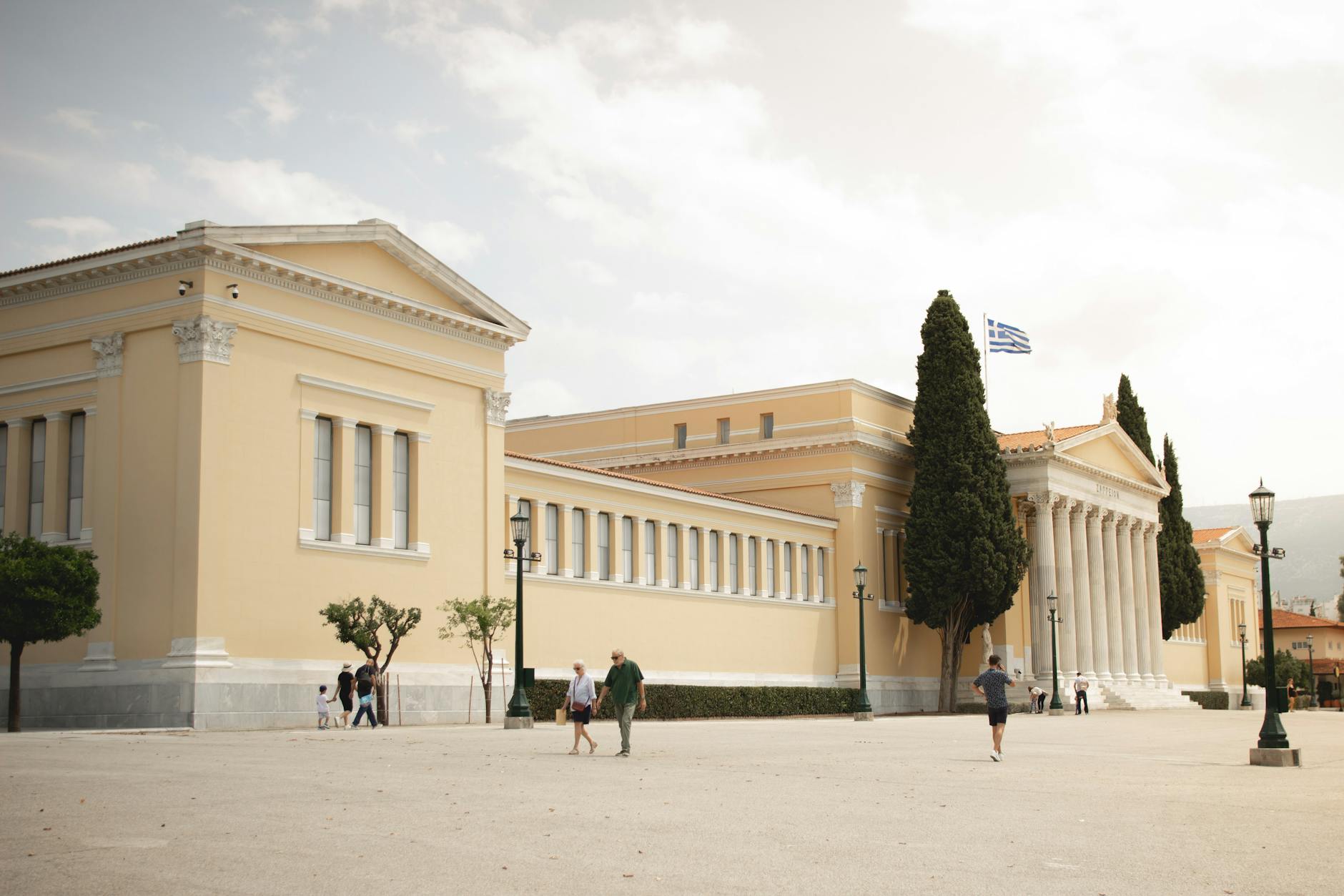 Zappeion Hall neoclassical architecture in Athens with columns and Greek flags