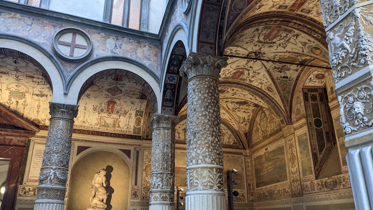 Renaissance frescoes and architecture in the courtyard of Palazzo Vecchio Florence