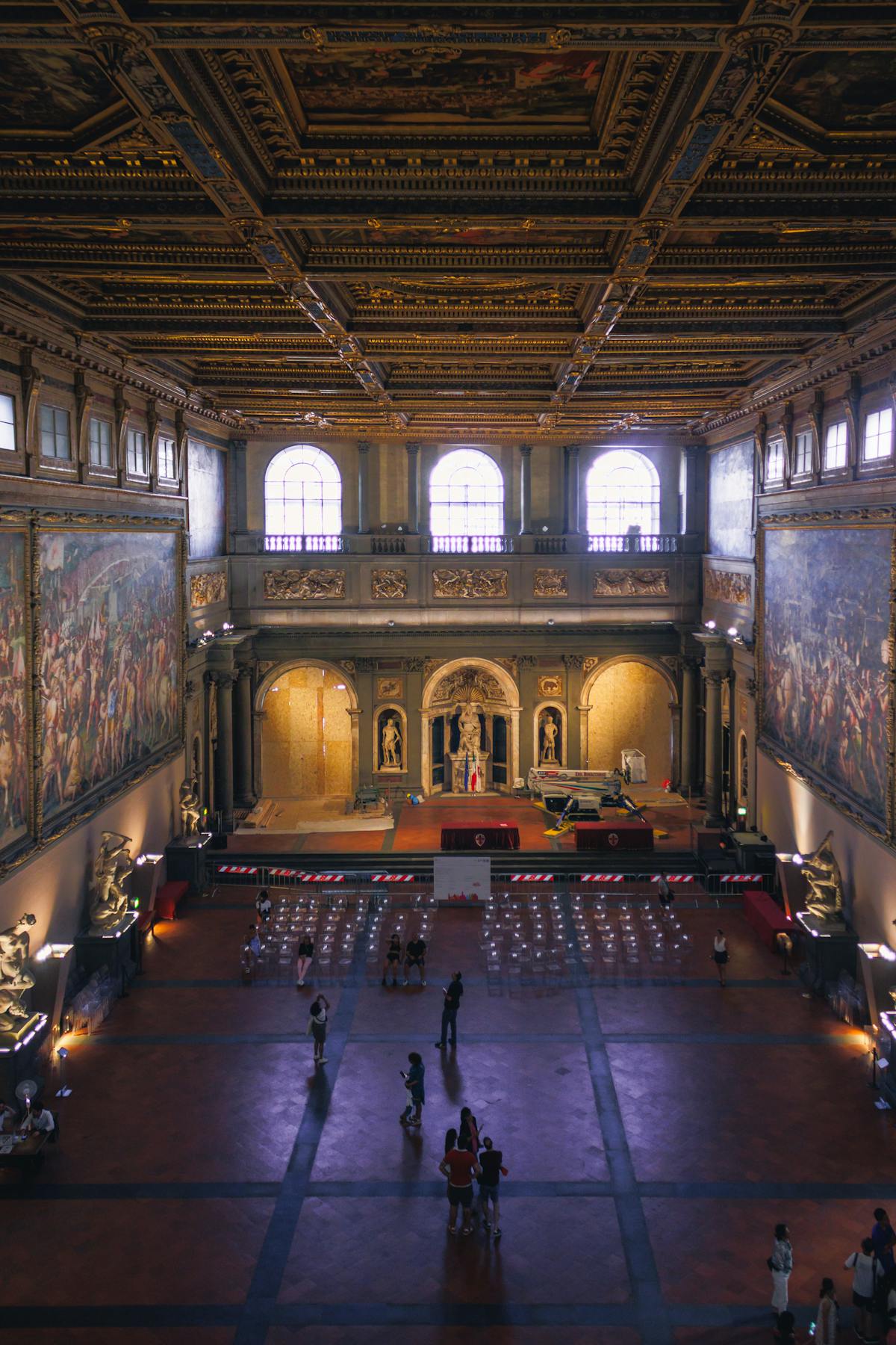 Grand interior hall of Palazzo Vecchio Florence showcasing Renaissance art and architecture