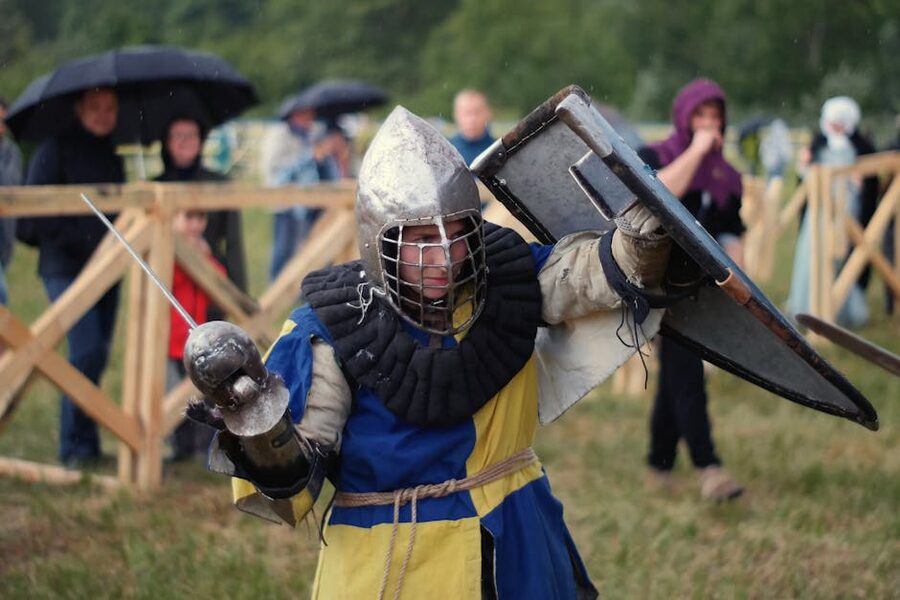 A knight in full armor at a medieval reenactment