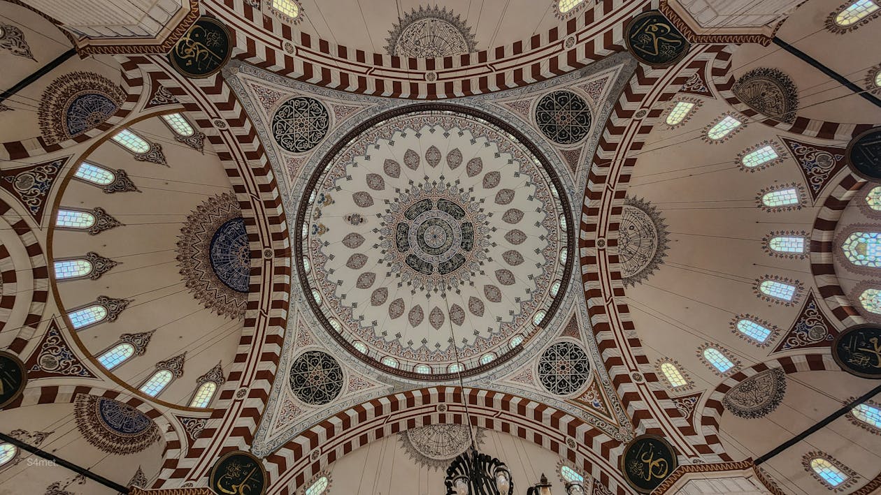Looking up at the interior dome of a mosque in Istanbul