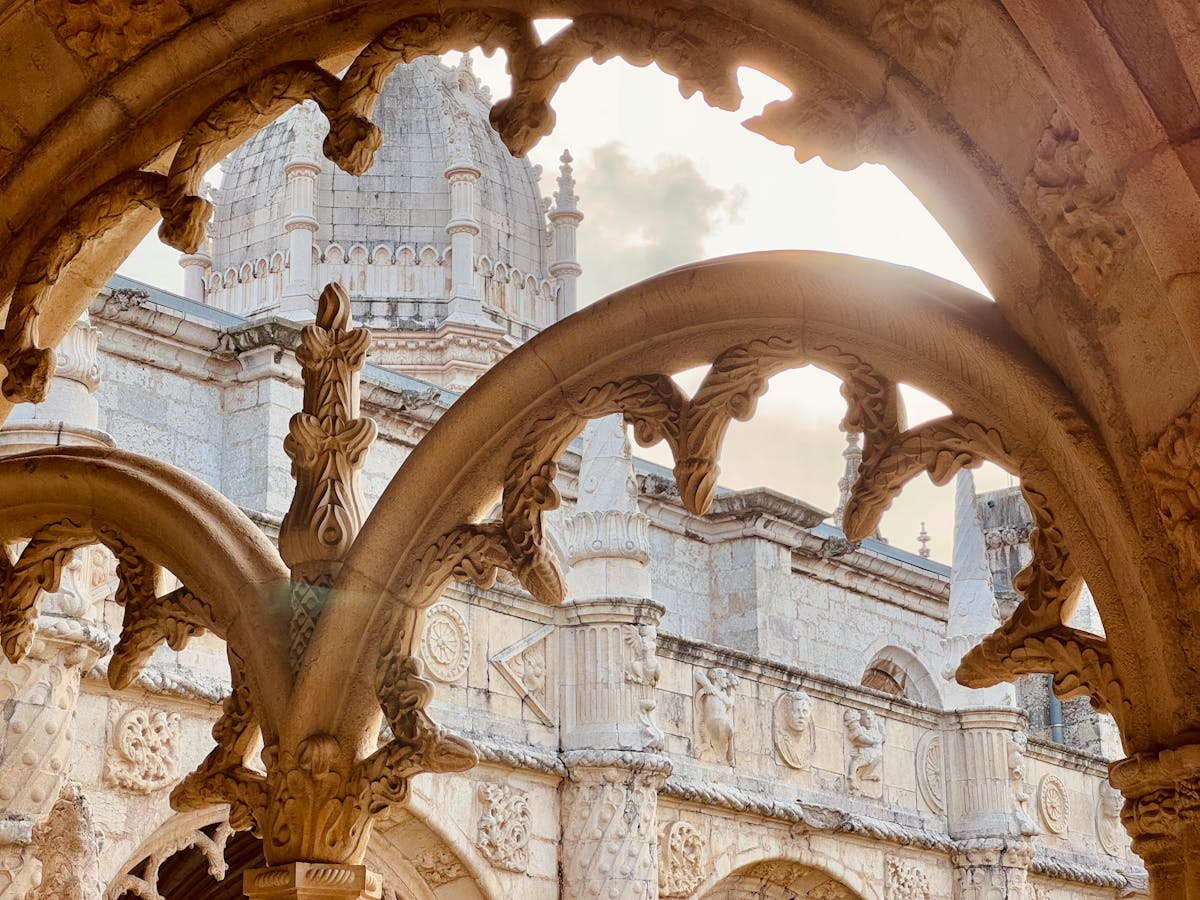 Detailed stone carvings on the walls of Jeronimos Monastery
