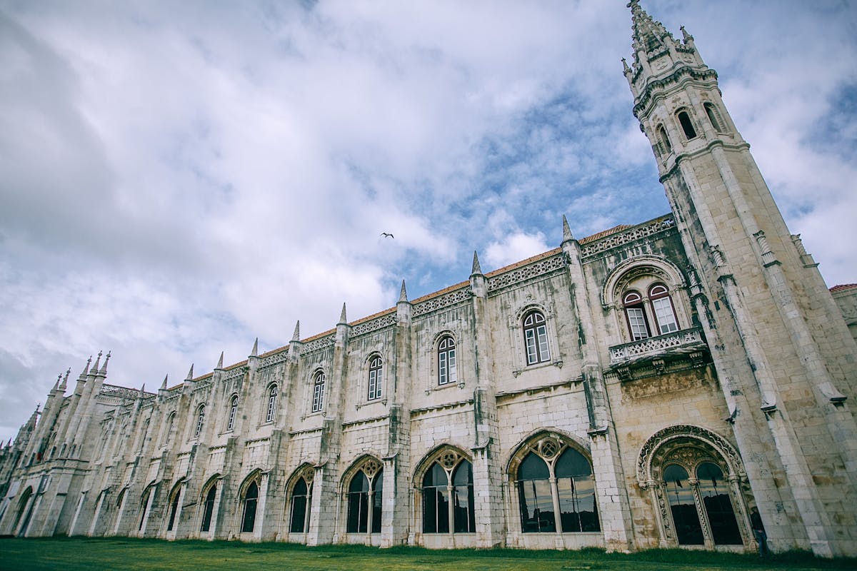 Exterior tower of Jeronimos Monastery against the sky