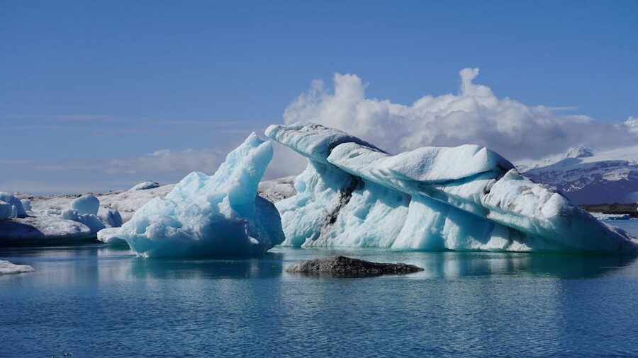 Crystal blue icebergs Jokulsarlon clear sky
