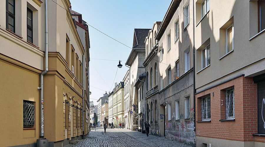 Jozefa Street with traditional tenement houses in Kazimierz, Krakow