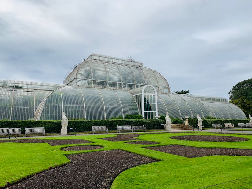 Kew Palm House lawns statues