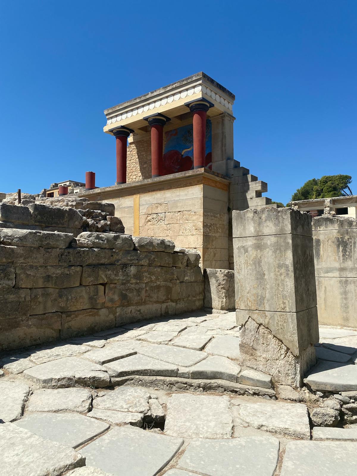Ancient red columns at Knossos archaeological site