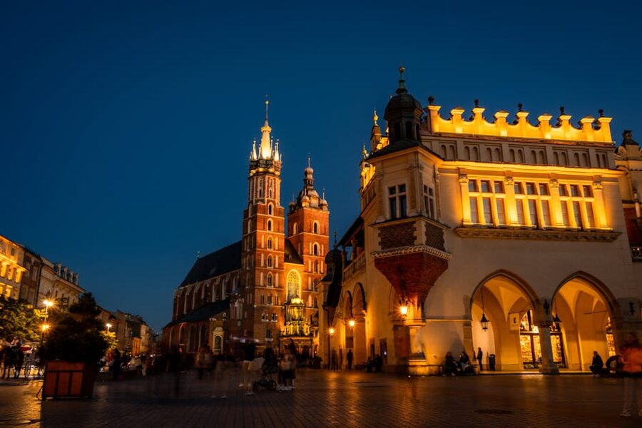 St Marys Basilica and Cloth Hall at night Krakow