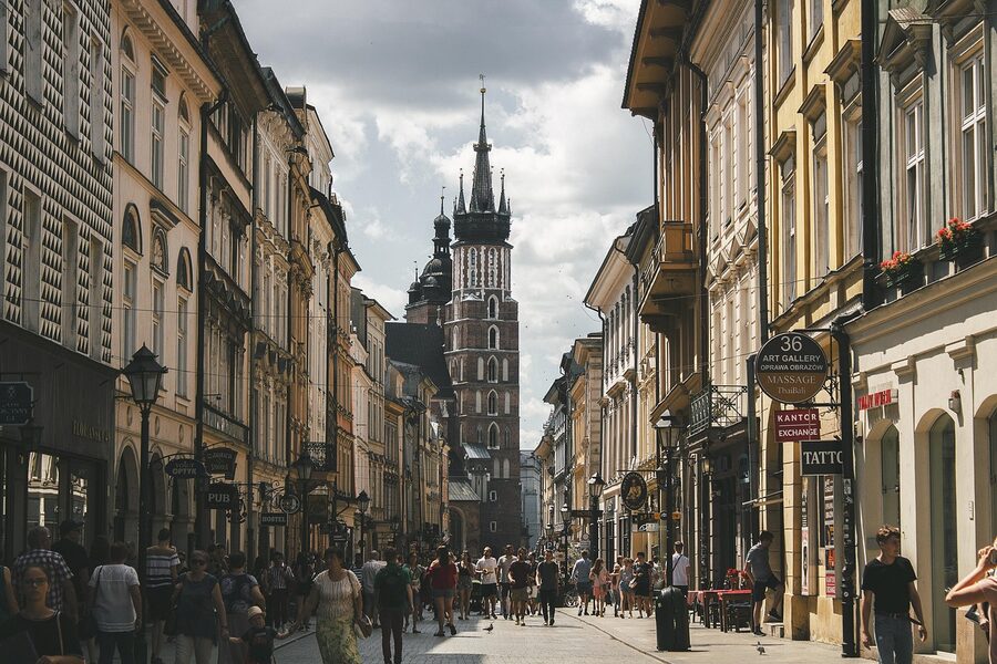Krakow street with Town Hall Tower in distance
