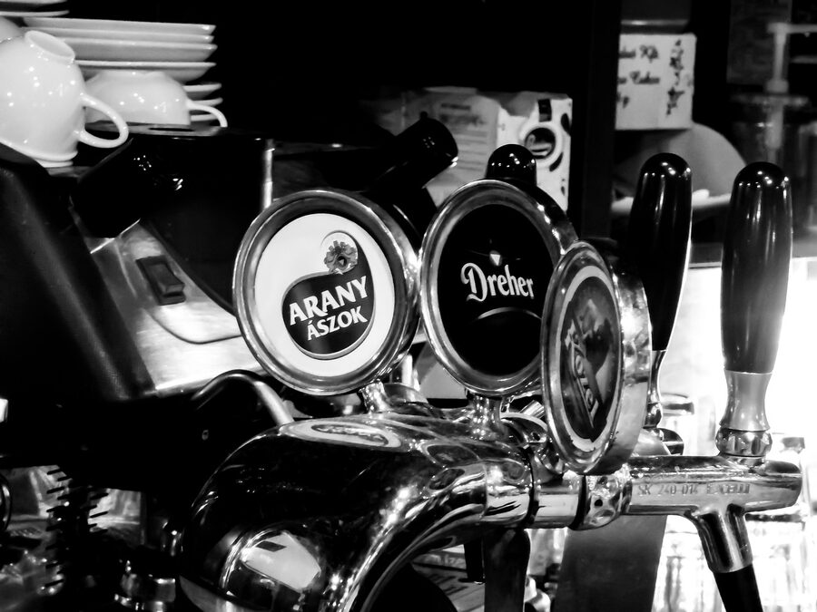 Bar counter with beer taps at a Krakow pub