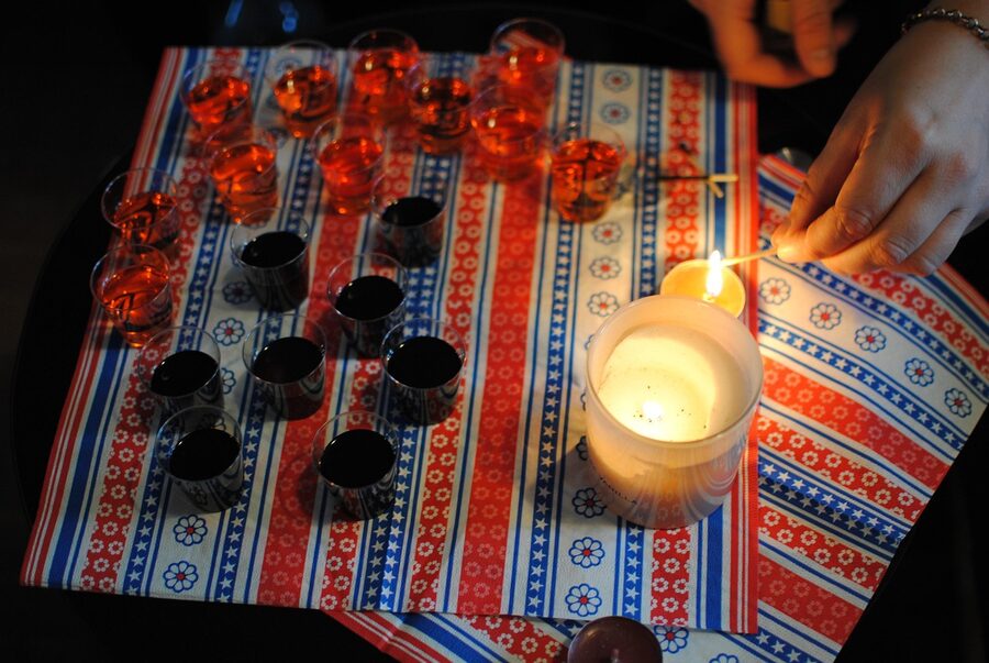 Welcome shots lined up on a bar for a Krakow pub crawl group