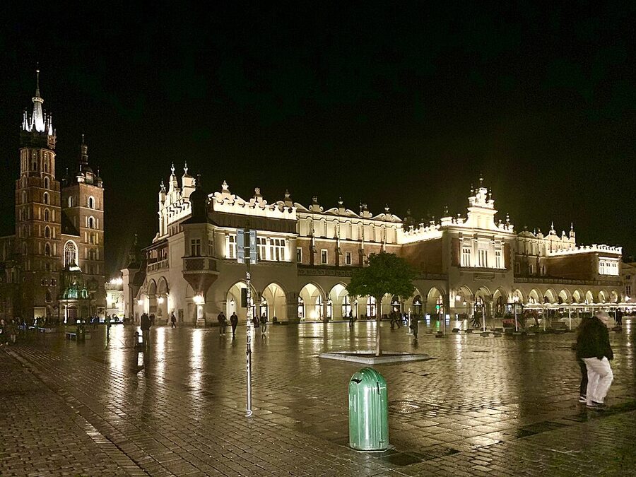 Sukiennice Cloth Hall lit up at night in Krakow Main Market Square