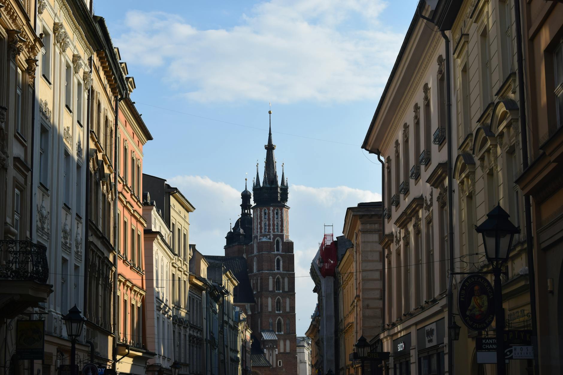 Charming Krakow street scene with St Marys Basilica in background