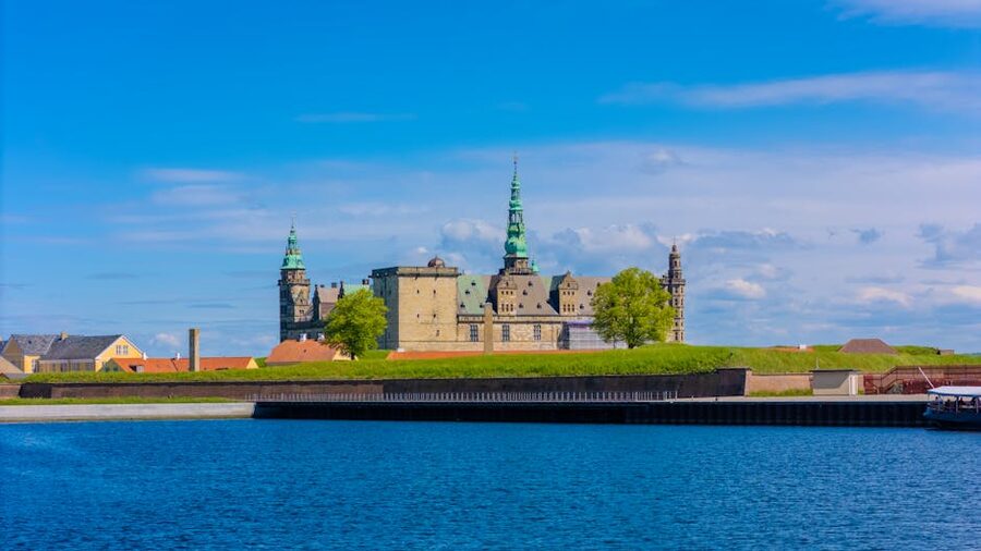 Kronborg Castle from across the water Helsingor under blue sky